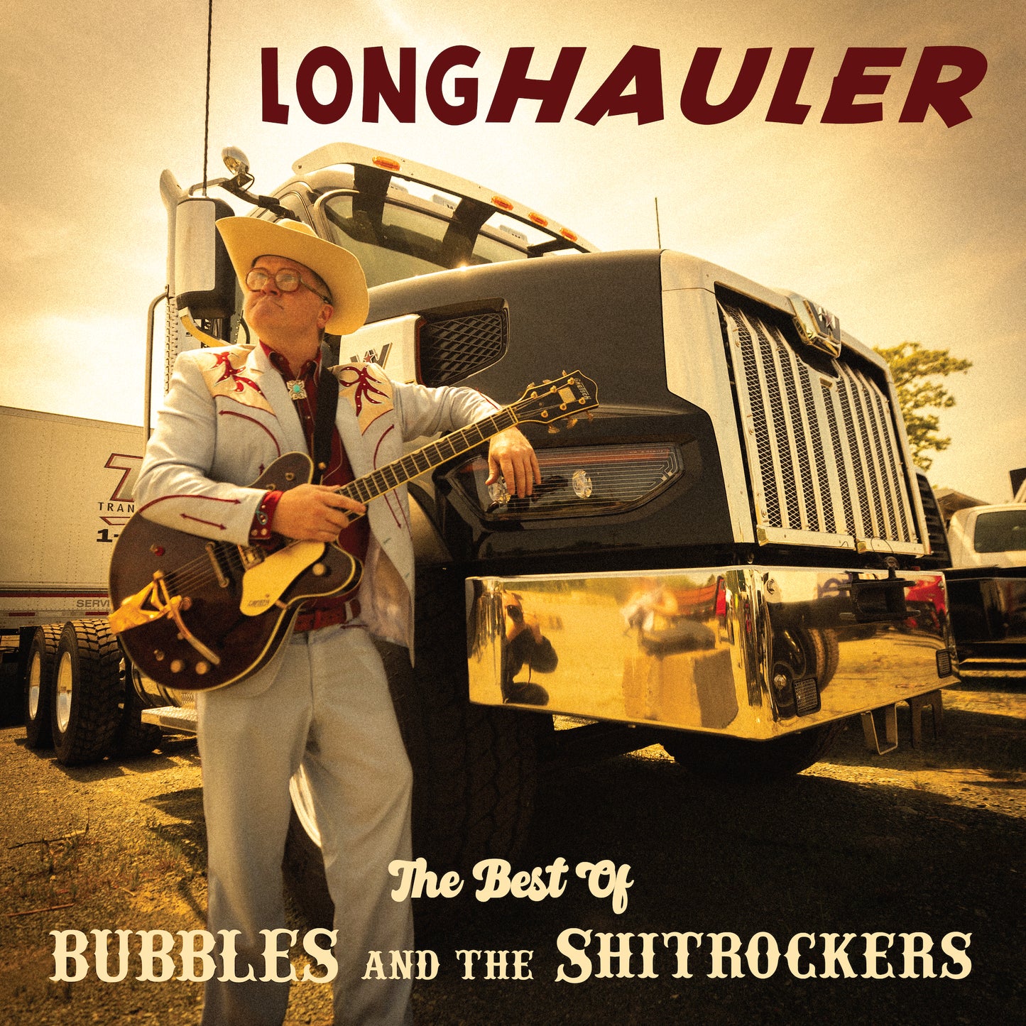 LIMITED EDITION LONGHAULER - The Best of Bubbles and the Shitrockers Fancy Blue Suit Edition